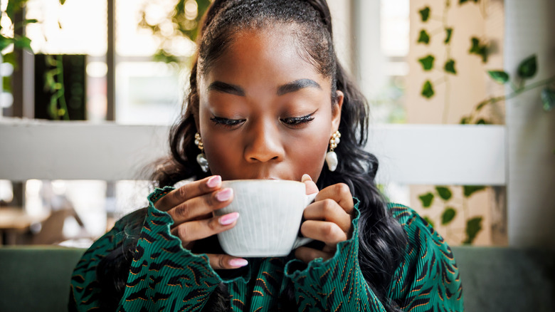 Woman drinking coffee