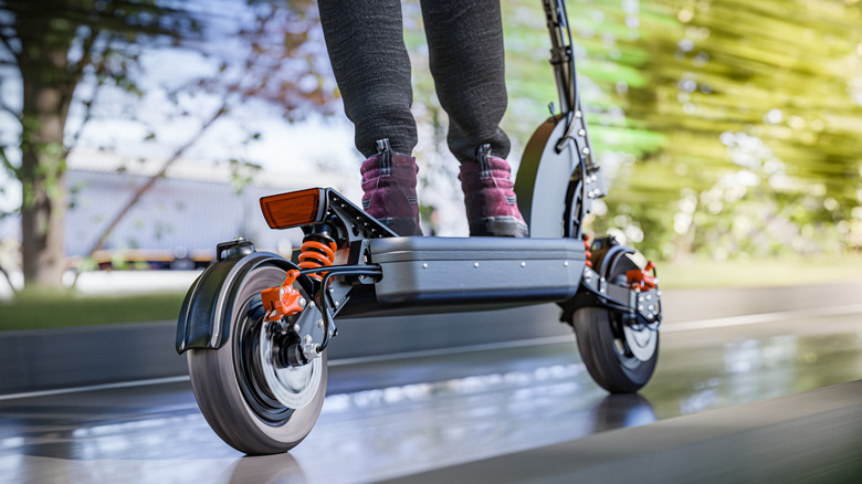 Person riding an electric scooter
