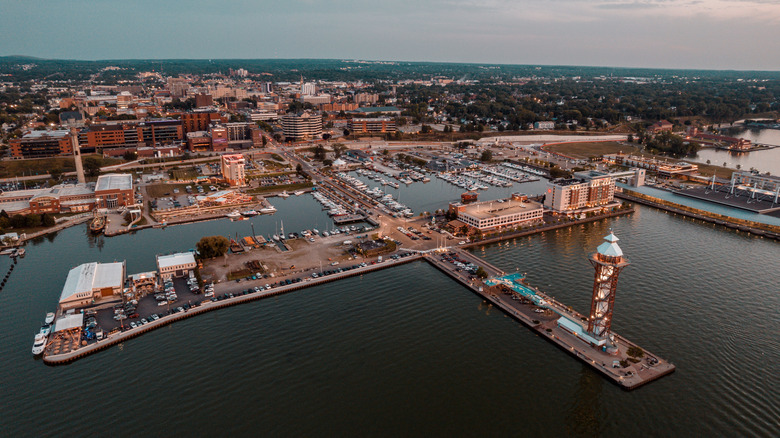Pier with tower and buildings on a bay