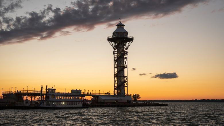 Tower on pier at sunset