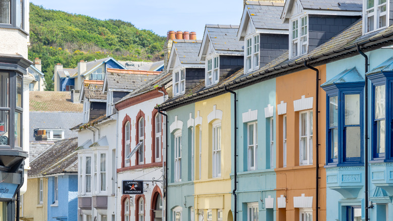 Colourful buildings line up in a row in the center of Aberystwyth