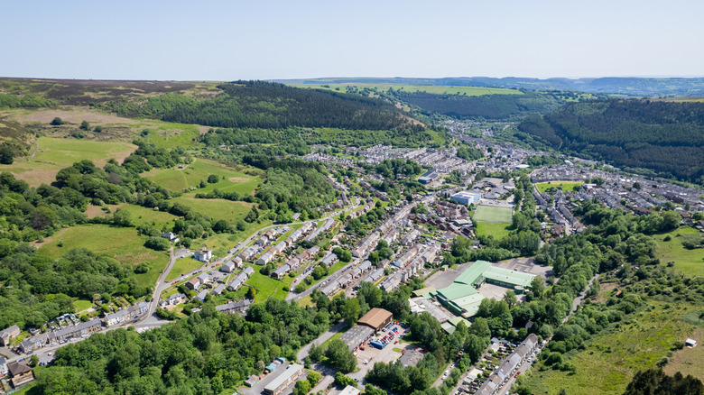 A town spreads through a green valley in the Welsh region of Blaenau Gwent