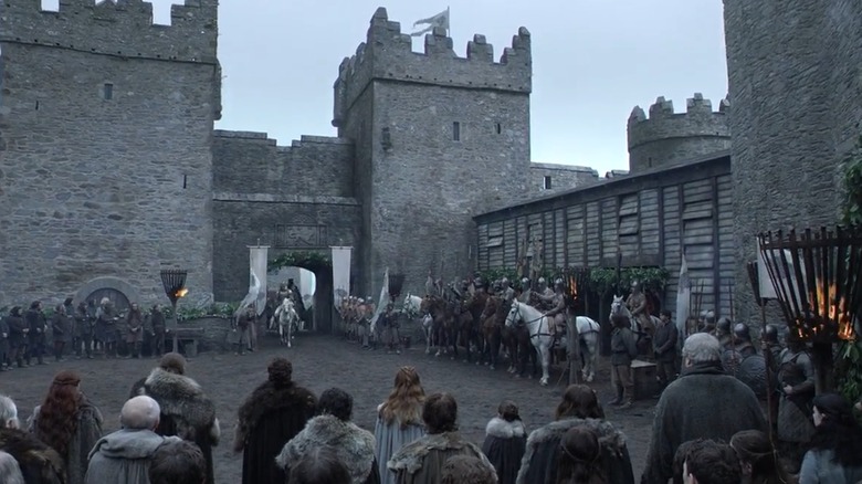 A Game of Thrones scene at Doune Castle where King Robert arrives at Winterfell