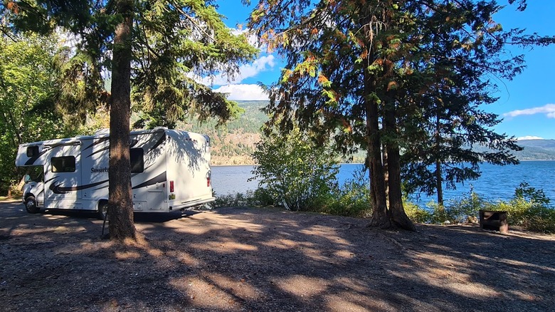 Campervan by the lakeshore on Bush Creek camping site