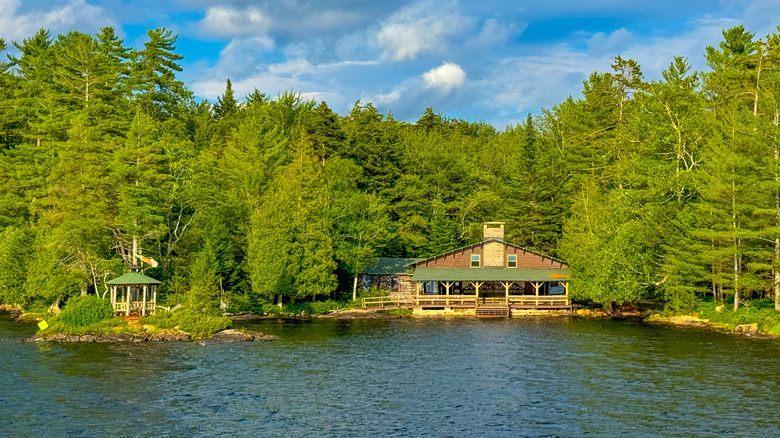 House on shoreline of Lake Raquette in Adirondack Park