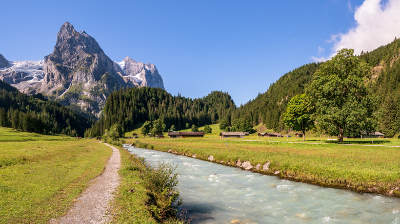 Rychenbach River in Switzerland with mountains in the background
