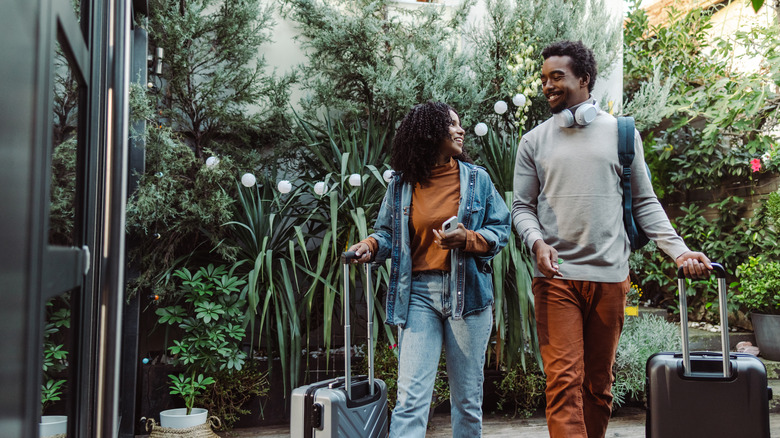 Couple with suitcases 