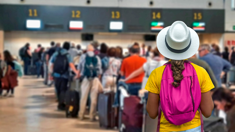 Girl waiting in line at airport
