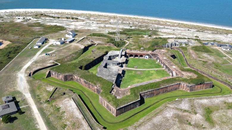 An aerial view of Fort Morgan with the beach and Gulf in the background.