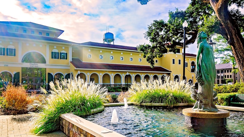 Daphne City Hall is pictured with its Daphne statue fountain in the foreground