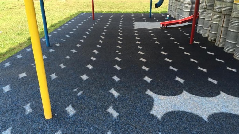 Shadows cast by the canopy at Lions Park Playspace in Greensboro, AL