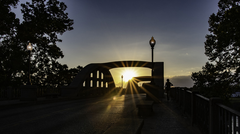 The sun goes down at the historic Bibb Graves Bridge in Wetumpka, near Lake Jordan