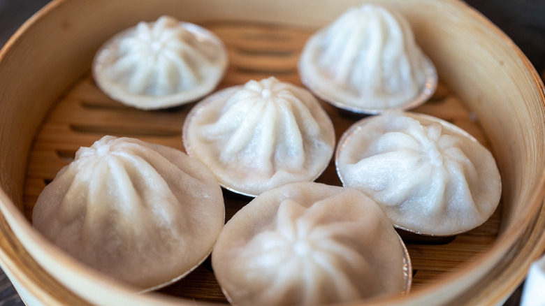 A close up shot of xiao long bao, Chinese soup dumplings