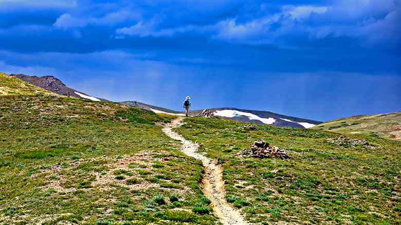 Hiker along the Continental Divide in the Rocky Mountains near Colorado's Loveland Pass