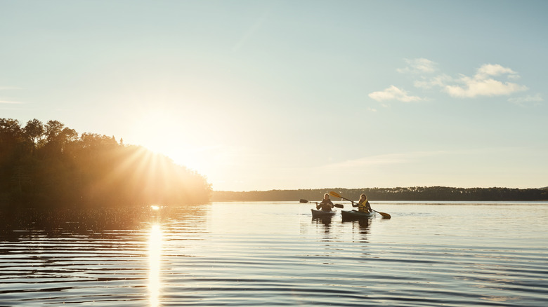 Couple kayaking on a lake