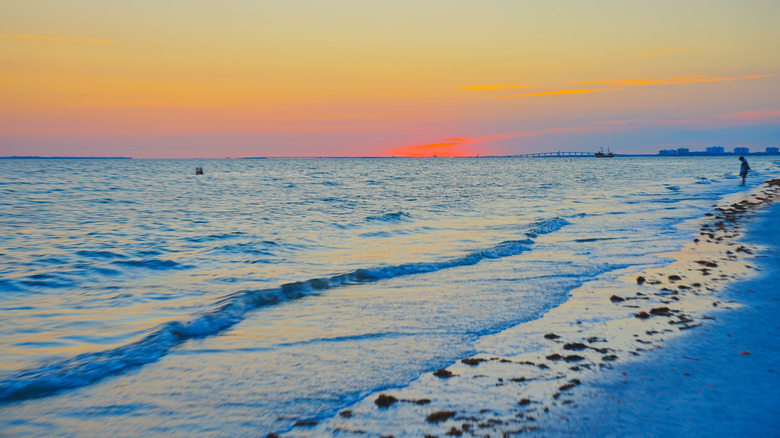 Beach and water at sunset