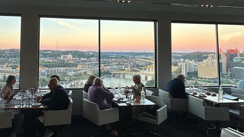 Diners by the windows at Pittsburgh's Altius
