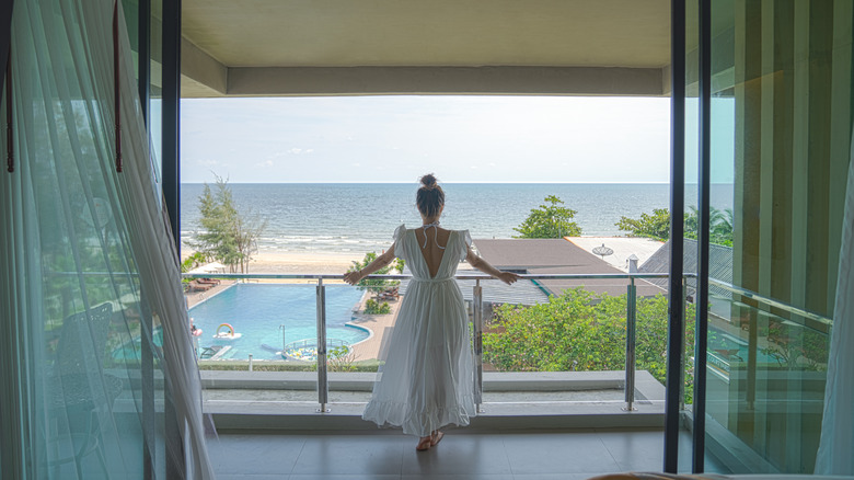 Woman with dress on balcony