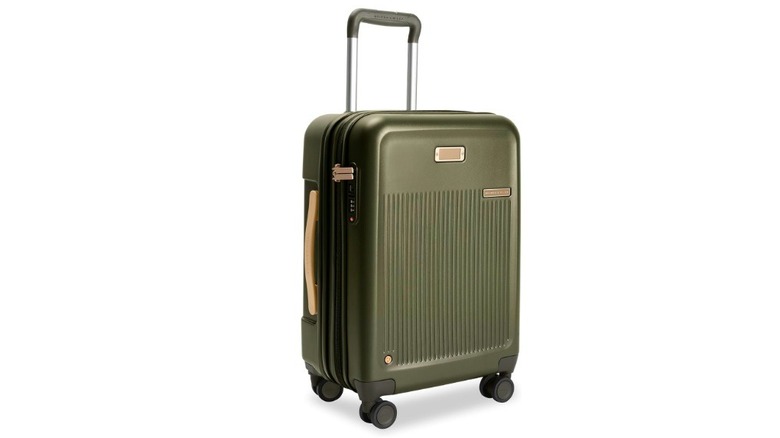 The Briggs & Riley Sympatico Essential 22-inch Carry-On Expandable Spinner suitcase in olive green.