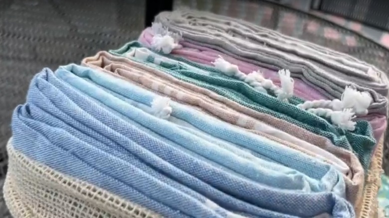Assortment of folded Lane Linen Turkish Beach Towels