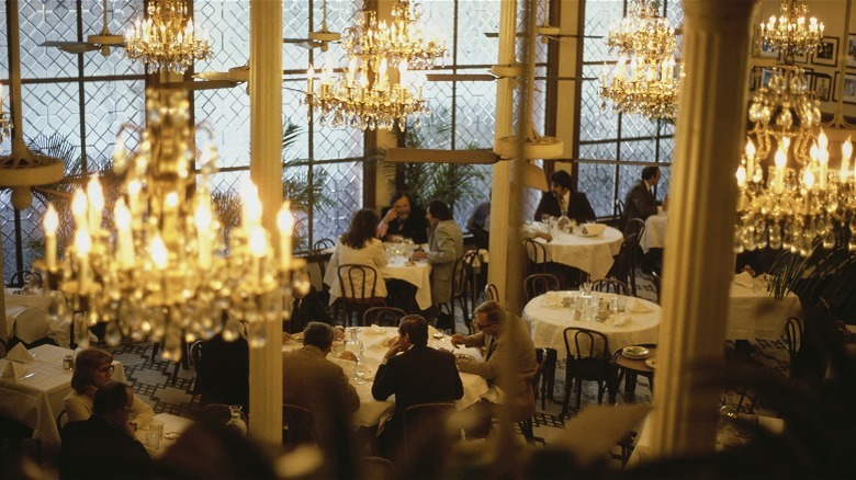 People eating inside Arnaud's Restaurant