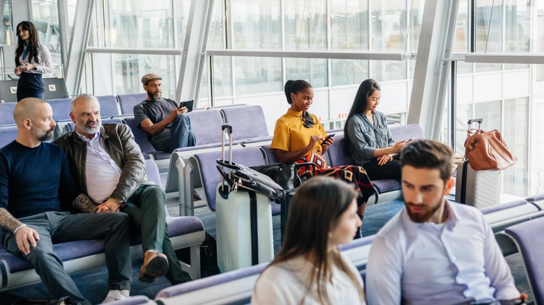Passengers waiting to board a plane