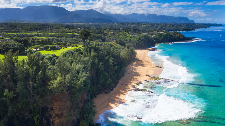 Secret beach is a stunning beach accessible by a trail on the island of Kauai in Hawaii.