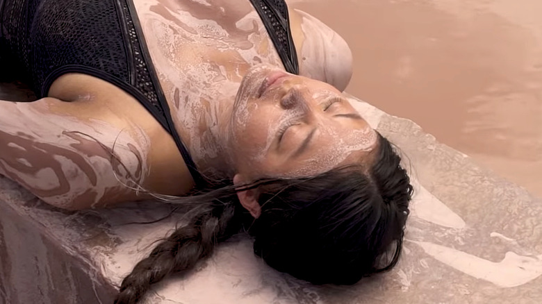 A woman relaxing at the Ojo Caliente hot springs