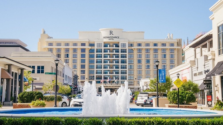 A hotel framing a shopping street at North Hills.