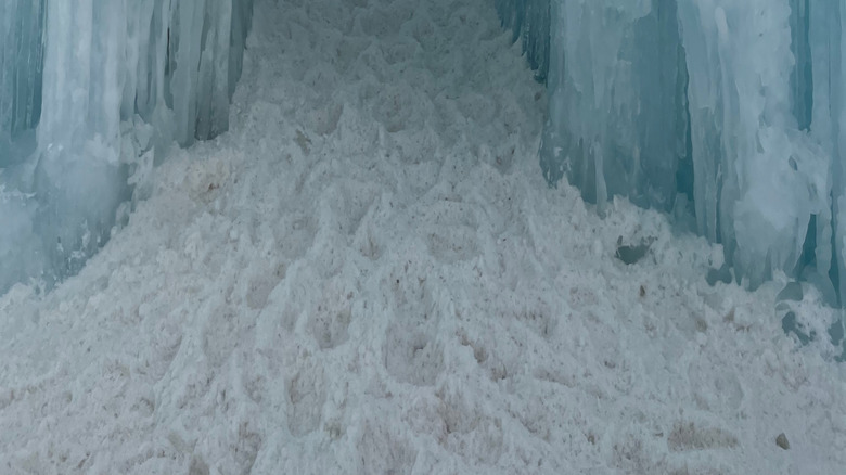An icicle covered tunnel in Ice Castles, Colorado