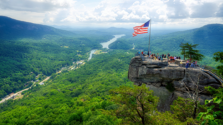 Chimney Rock overlooks Lake Lure in the distance.
