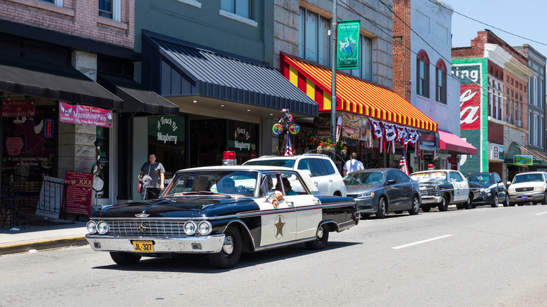 Vintage police cruiser on Main Street