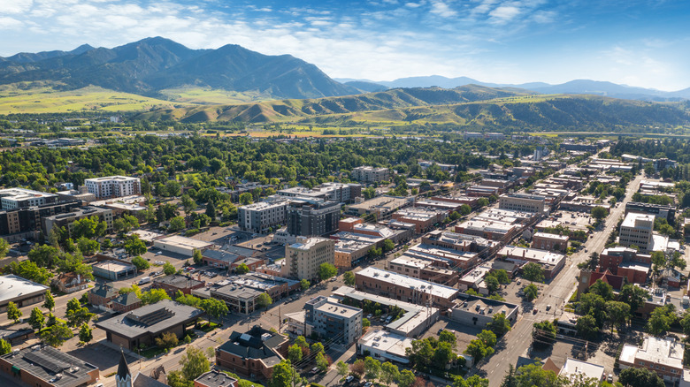 An aerial view of Bozeman, Montana, with mountains in the background