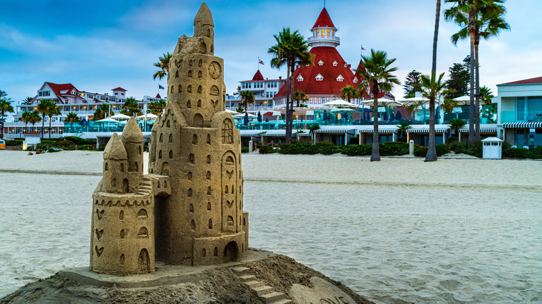 A sandcastle on Coronado Beach with the famous Hotel del Coronado in the backdrop