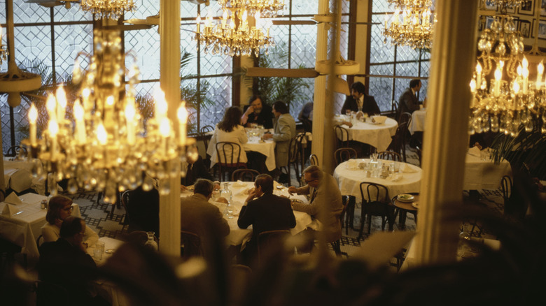 People eating inside Arnaud's Restaurant