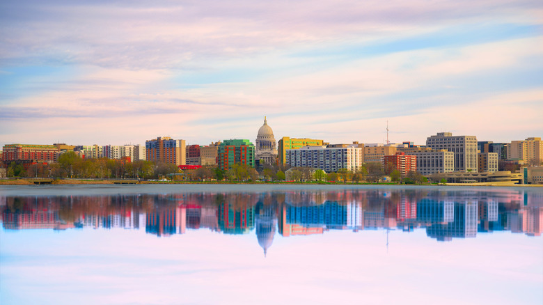 Madison, Wisconsin skyline reflected over lake