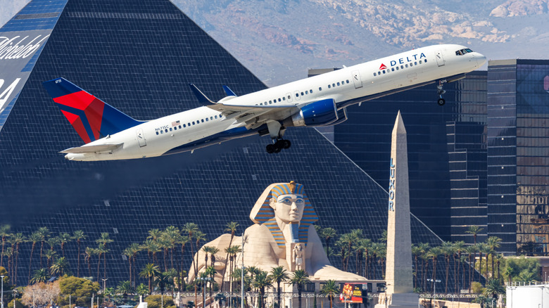 A Boeing 757 aircraft from Delta Air Lines' fleet departing from Las Vegas Airport in Nevada on a bright day.
