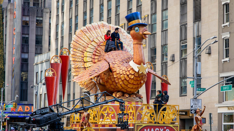 Macy's Thanksgiving Day parade with giant turkey float in NYC