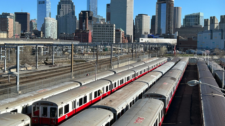 Boston's "T" trains with the skyline in background