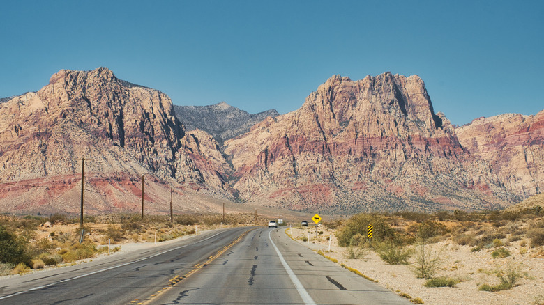 Dusty mountains rise from the desert in Nevada