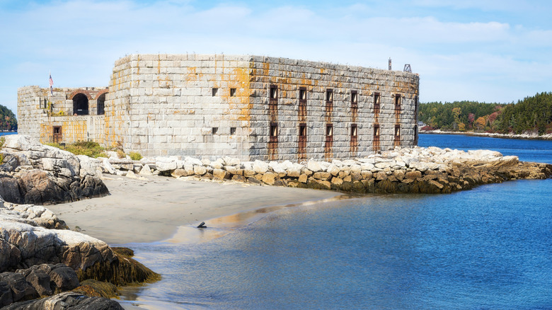 Civil War stone fort on blue water and beach Popham Beach Maine
