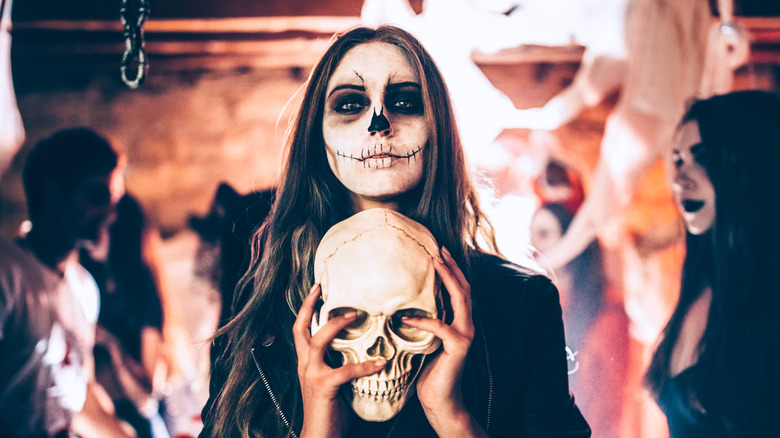 Haunted house-goer dressed as a skeleton