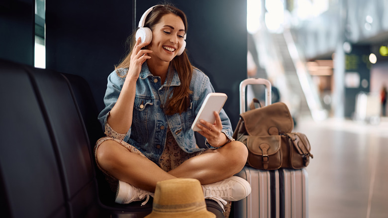 Traveler comfortably waiting at airport