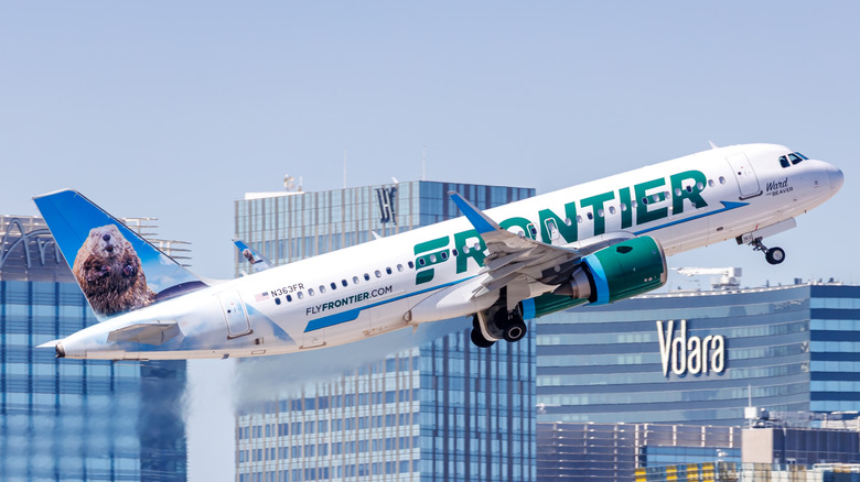 A Frontier Airlines plane taking off