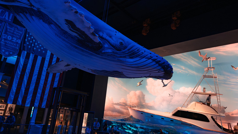 A whale and fishing boat the Wonders of Wildlife National Museum and Aquarium
