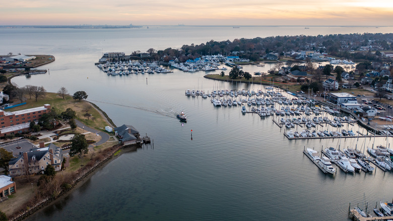 hampton harbor at sunset with boats docked