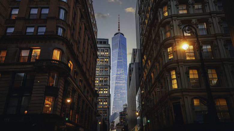 freedom tower in new york city through gap in buildings