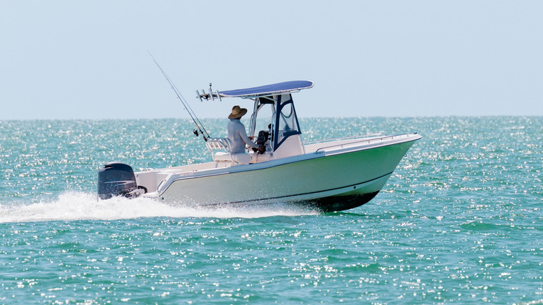 Fisherman on his boat in the ocean