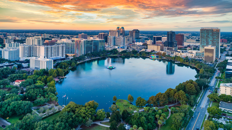 An aerial view of downtown Orlando, Florida and Lake Eola at sunset