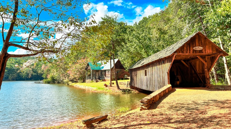 Historic log structures near the lakeshore at Hart Square Village